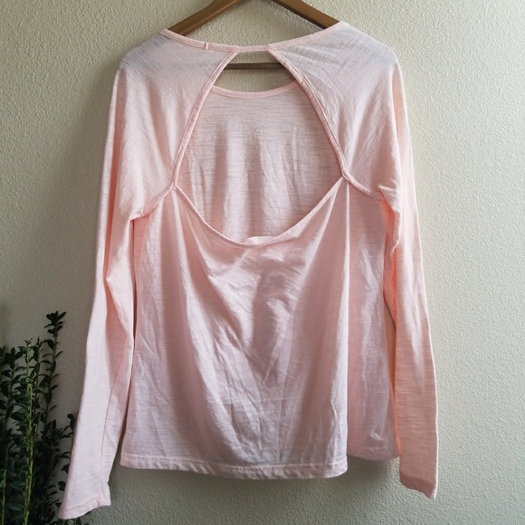 Reebok Tops - Reebok • pink athletic wear cut out back top